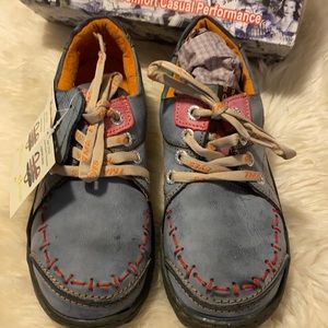 New in box. Funky denim blue sneakers/ walking shoes.